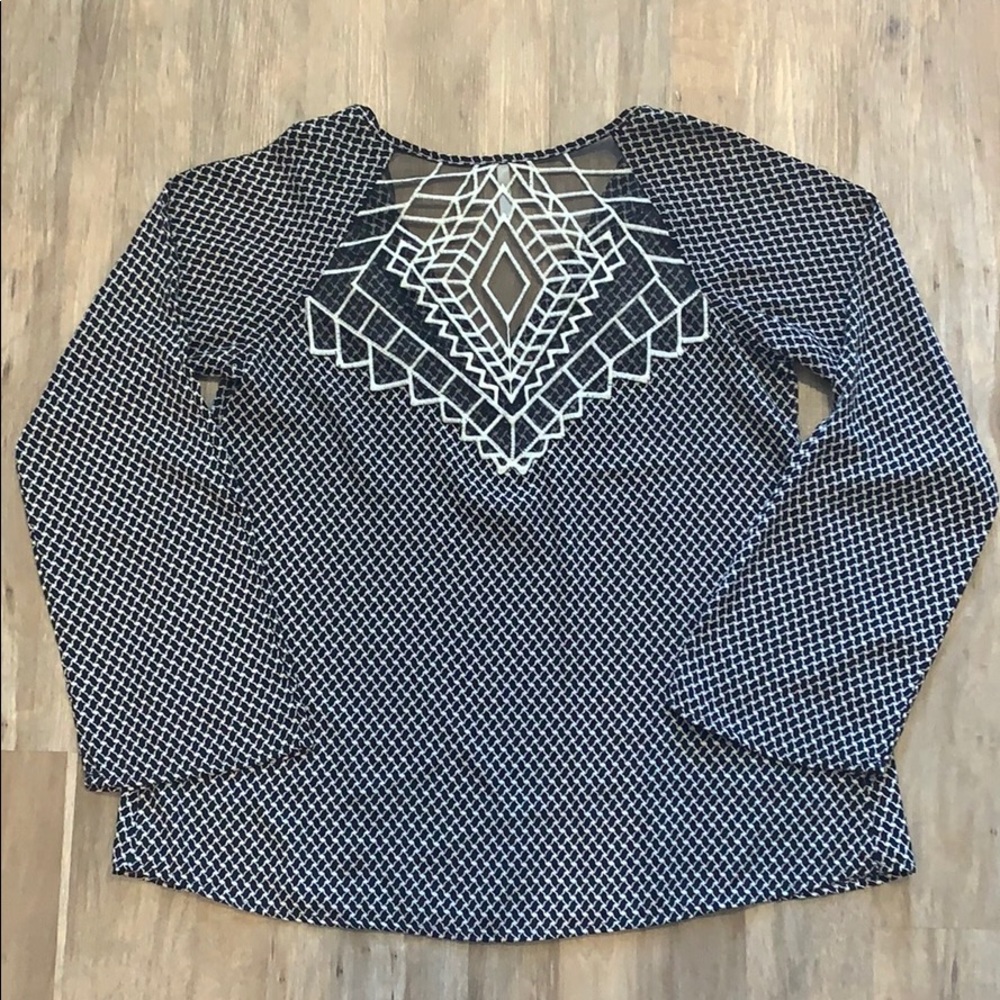 Black and white bell sleeve top with diamond back